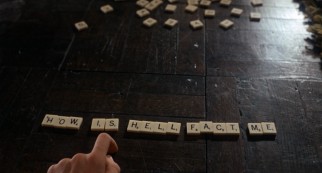 Rosemary consults Scrabble tiles to uncover a meaningful cautionary Anagram.