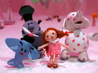 The journey brings Rudolph and Hermey to the Island of Misfit Toys.