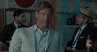 Wealthy American businessman Hal Sanderson (Aaron Eckhart) lends his help with expectations.