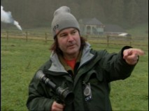 Gore Verbinski directs a ranch scene in a wool cap in "The Origin of Terror."