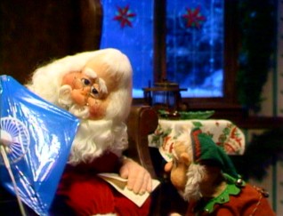 Santa Claus (whom the 30-year-old Paul Fusco gives an ALF-like sound) admires Sherman's unusual handiwork in this electric fan/kite combination.