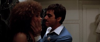 Tony (Al Pacino) is overprotective of his younger sister Gina's (Mary Elizabeth Mastrantonio) sexuality, but tolerates her afro.