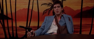 The backdrop of serene Miami sunset stands in contrast to Tony Montana's (Al Pacino) violent rage.