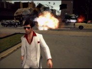 Tony Montana walks coolly away from a car explosion in "Scarface: The World is Yours", a video game whose making is detailed here.