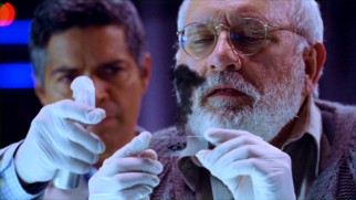 Tom (Esai Morales) and Dimitri Kandinsky (Jay Brazeau), just the old Soviet scientist Seattle needed, test Chloe's heavy water theory with a spray bottle and a piece of the highly reactive specimen.