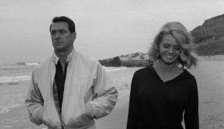Tony Wilson (Rock Hudson) effortlessly meets a love interest in Nora Marcus (Salome Jens) on the Malibu beach outside his new home.