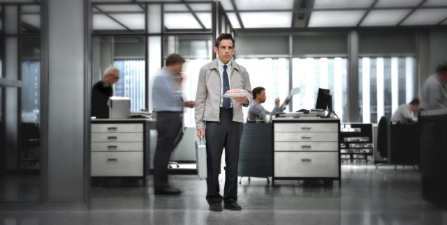Walter Mitty (Ben Stiller) holds a clementine pie while daydreaming at his workplace in "The Secret Life of Walter Mitty."