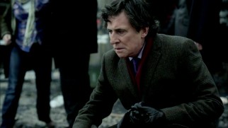 Deputy Prime Minister Tom Dawkins (Gabriel Byrne) visits the site of an oil refinery explosion in Scarrow.