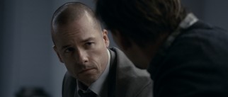 Simon (Guy Pearce) offers his organization's services to a highly upset Will in the hospital.