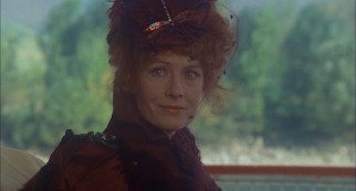 Vanessa Redgrave plays "Lady of the Lilies" Lola Deveraux, the redheaded woman whose abduction drives the film's climactic mystery.