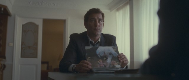 MI5 agent Mac (Clive Owen) has incriminating and painful photographs to support his pitch for Collette to become an informant.