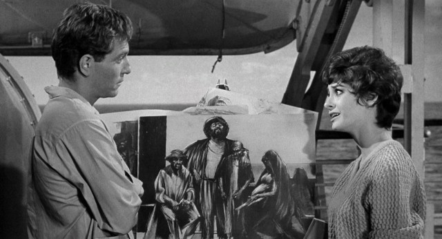 Young couple David (George Segal) and Jenny (Elizabeth Ashley) do not see eye-to-eye on the value of his artwork (a rendering of Henry Calvin) in "Ship of Fools."