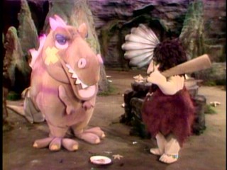 A caveman and his dinosaur take over the Ooze family cave in "The Dinosaur Show."