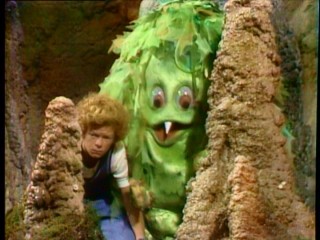This sight of a serious Johnny and Sigmund approaching the cave can only mean that Scott needs rescuing.