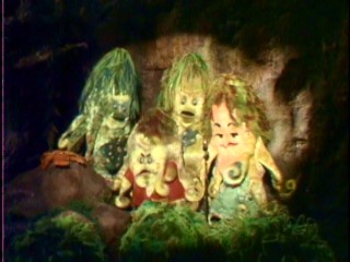 The Ooze family -- Slurp, Big Daddy, Blurp, and Sweet Mama -- have far less success with singing than their runaway son/brother Sigmund.