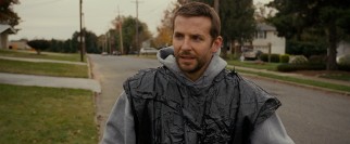 As part of an effort to get his life in order, Pat Jr. (Bradley Cooper) takes to running around his Philadelphia neighborhood in a garbage bag.