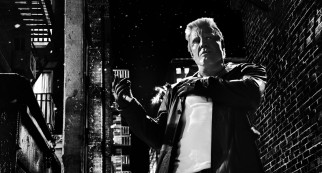 Marv (Mickey Rourke) takes a bullet to a shoulder, which only makes him angry.