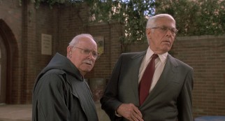 Principal Father Maurice (Barnard Hughes) and administrator Mr. Crisp (James Coburn) aren't sure about Sister Mary Clarence.
