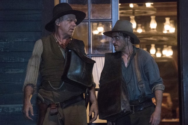 John C. Reilly and Joaquin Phoenix star as outlaws Eli and Charlie Sisters in "The Sisters Brothers."