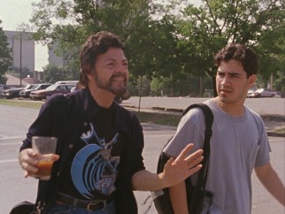 In "Slacker", this rambling coffee drinker (Jerry Deloney) drops a wealth of conspiracy theory on this not terribly interested young man (Tom Pallotta) he follows.