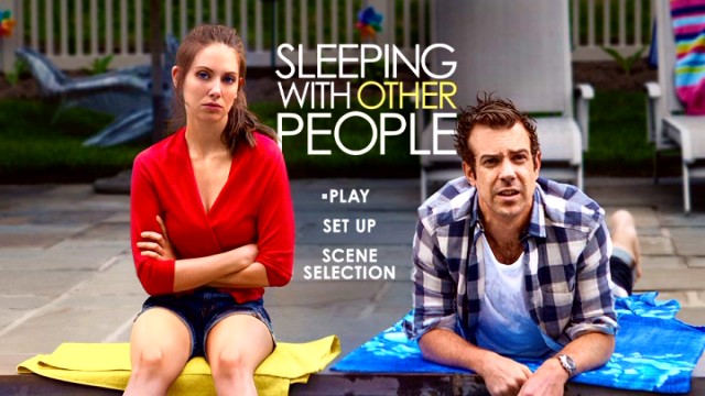 Alison Brie and Jason Sudeikis strike discontented poses on the poster-adapted Sleeping with Other People DVD main menu.