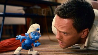 New Scottish Smurf Gutsy talks tough to a tied-up Patrick Winslow (Neil Patrick Harris) in "The Smurfs."
