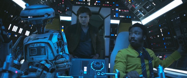 Han Solo (Alden Ehrenreich) gets his first look at the Millennium Falcon with Lando Calrissian (Donald Glover) and his droid L3-37 at the controls in "Solo: A Star Wars Story."
