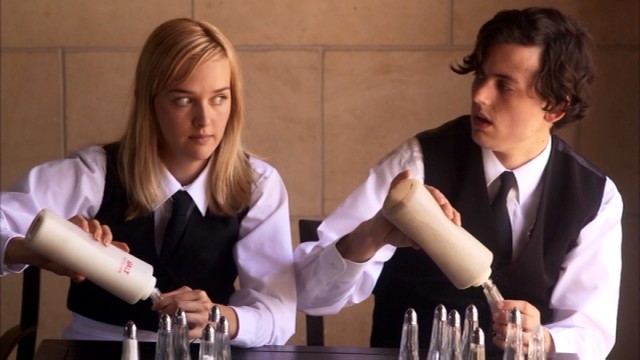 Socially awkward waiters Lyla (Jess Weixler) and Max (Keith Poulson) swiftly marry in the indie comedy "Somebody Up There Likes Me."