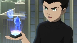 Precocious Damian Wayne pulls up some of the data he hacked out of his father's computer.