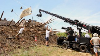 Men in shorts get the audio and video needed for an action scene.