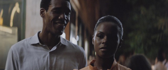 Barack (Parker Sawyers) and Michelle (Tika Sumpter) run into a work colleague after getting out of seeing "Do the Right Thing" in theaters.