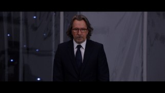 Nathaniel Shepherd (Gary Oldman) has much more presenting to do in this extended scene.