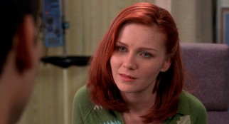 Kirsten Dunst plays Mary Jane Watson, the girl next door who functions as love interest both to Spider-Man and Peter Parker.