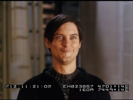 As if Peter Parker's Emo look wasn't enough, Tobey Maguire makes a goofy face in the Spider-Man 3 bloopers.