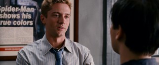 Topher Grace joins the cast as cocky photographer Eddie Brock, who competes against Peter for a position on the Daily Bugle's staff.