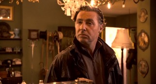 Douglas "Mad Dog" Flynn (David O'Hara) is not pleased there's no envelope for him in the till of Maguire's Antiques.
