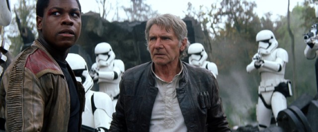 Finn (John Boyega) and Han Solo (Harrison Ford) find themselves surrounded and outnumbered by Finn's former colleagues, the First Order's stormtroopers.