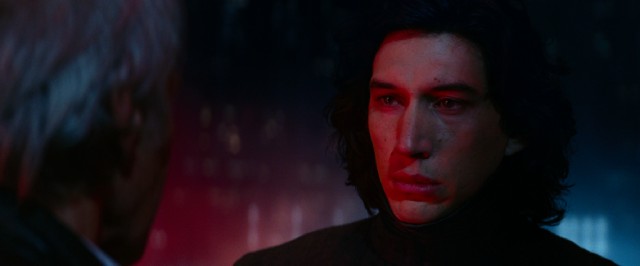 Kylo Ren (Adam Driver) faces his father with a lush head of hair.