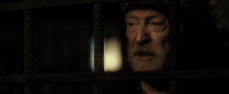 Dungeon prisoner Benjamin Salt (Michael Caine) claims that he should be running the place.