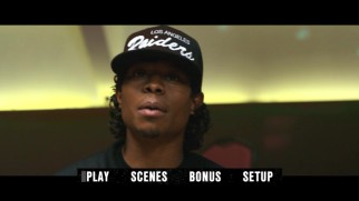 Eazy-E rocks a Los Angeles Raiders hat on the Straight Outta Compton DVD main menu.