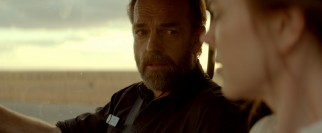 Hugo Weaving is spared the usual heavy make-up to play David Rae, the chief detective investigating the crime.