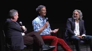 A colorfully dressed Bill Murray answers questions between Ivan Reitman and Mitch Glazer at TIFF's Bill Murray Day.
