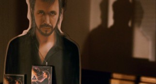 Motivational psychic next door Graham Purvis (Paddy Considine) gets his own cardboard standee at his appearance.