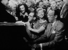 The one all-new bonus feature is this deleted scene that finds Artie Green's New Year's Eve partygoers singing "The Paramount Don't Want Me Blues."