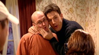 Ben Affleck has fun with director Mike Mitchell in the HBO First Look special "Surviving Christmas: Unwrapping Comedy."