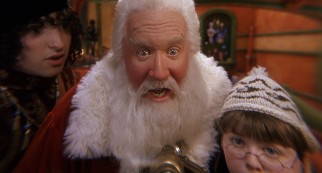 Santa Claus (Tim Allen) discovers the Mrs. Clause in the even smaller print hiding deep within his business card.