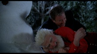 Martin Short and Tim Allen can't stifle their laughter whilst wrestling next to a snowman in the Santa Clause 3 blooper reel.