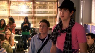 Cameron (Nicholas Braun) takes Michael's (Kyle Kaplan) advice to try peacocking, but the pink shirt, hat, and scarf look only give Bianca more reason to suspect he's gay.