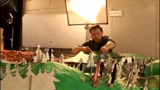 Co-director Vincent Patar positions pine trees in "La Fabrique de Panique", a documentary that shows a cramped, messy studio that's far from those of the CGI powerhouses.