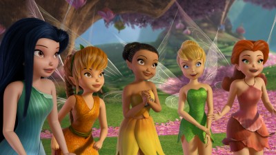 The five major fairies of "Tinker Bell" emote in the colorful Pixie Hollow.